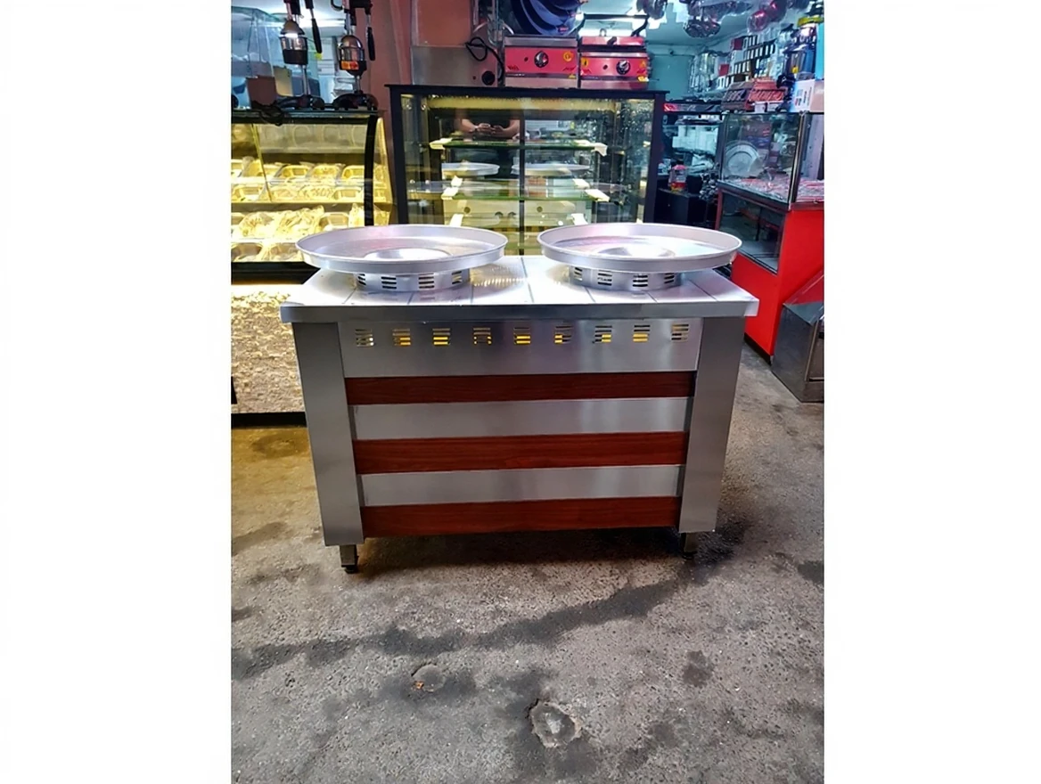 2tb6xrn48hrm80ctw4csvhbphr Double-Legged Mussel Shawarma Table - Image 1