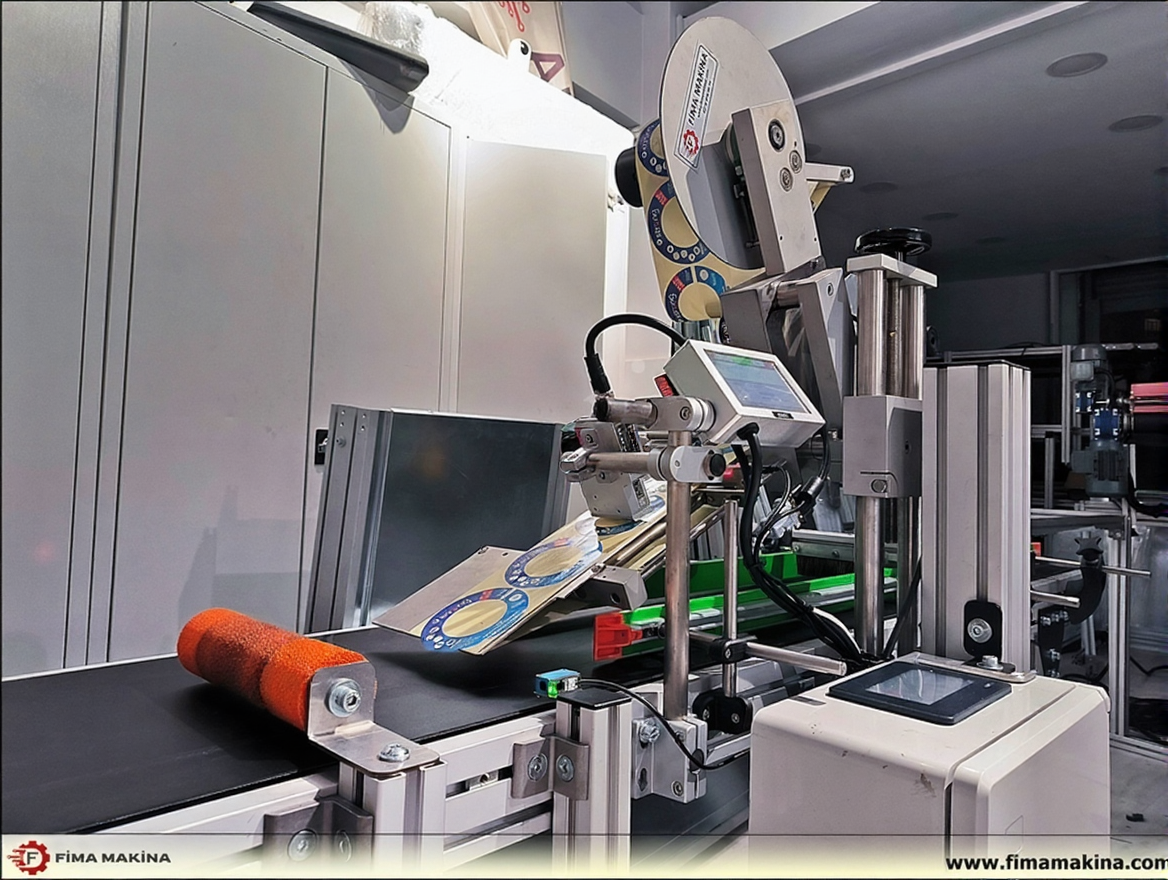 87z7p52nvnrma0ctnhrawzyrdr Automatic Labeling Machines - Bottle Wrapping and Top Labeling Machine - Image 1