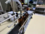 Conveyorized Automatic Liquid Filling Machine - Image 2