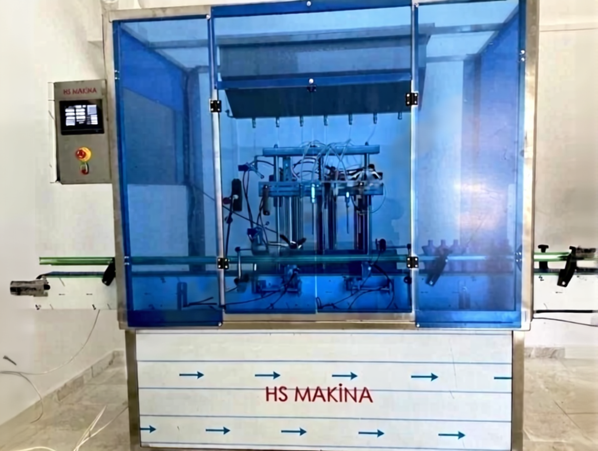 cx9xyf0ywxrm80ctnvgszm11yg 6-Nozzle Servo Liquid Filling Machine - Image 1