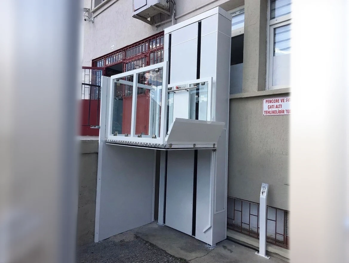 hna3abvmysrma0cttn7v1v9sq4 Vertical Hydraulic Disabled Elevator - Image 1