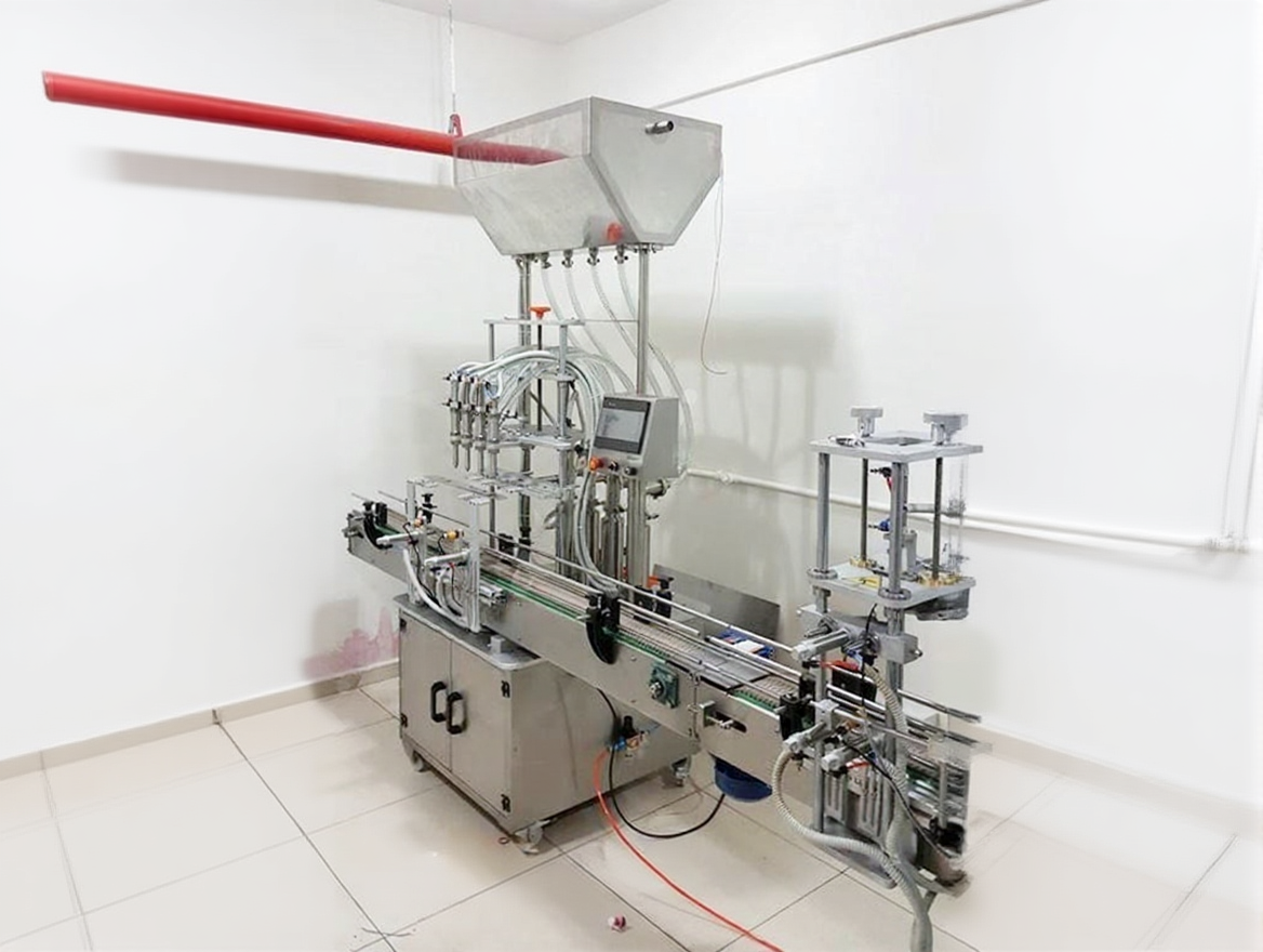 krkjmdg039rm80ctnptbzfdcwm 4-Nozzle Fully Automatic Liquid Filling Line - Image 1