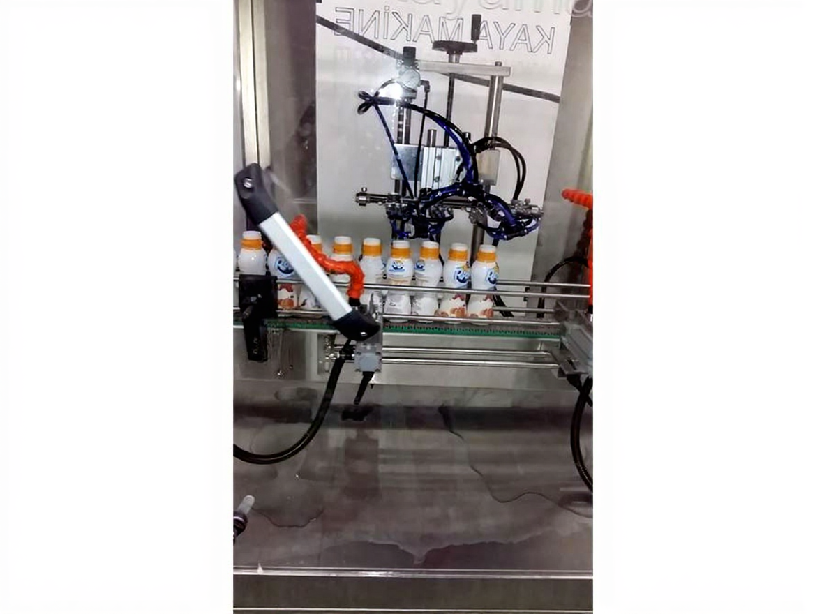 qzwnf5sd1srm80ctnvvbbqsy90 5 Nozzle Automatic Fruit Yogurt Filling Line - Image 1