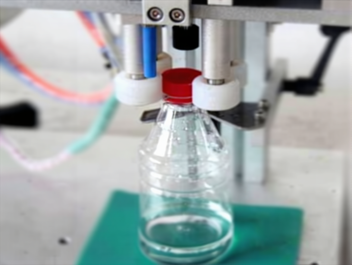 wge4vz2krnrma0ctn5yvdr9yhr Trigger Cap Capping Machine - Image 1